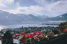 View from the balcony in Apartments Haus Altenberger by we rent. Lake view, city view, and mountain view.